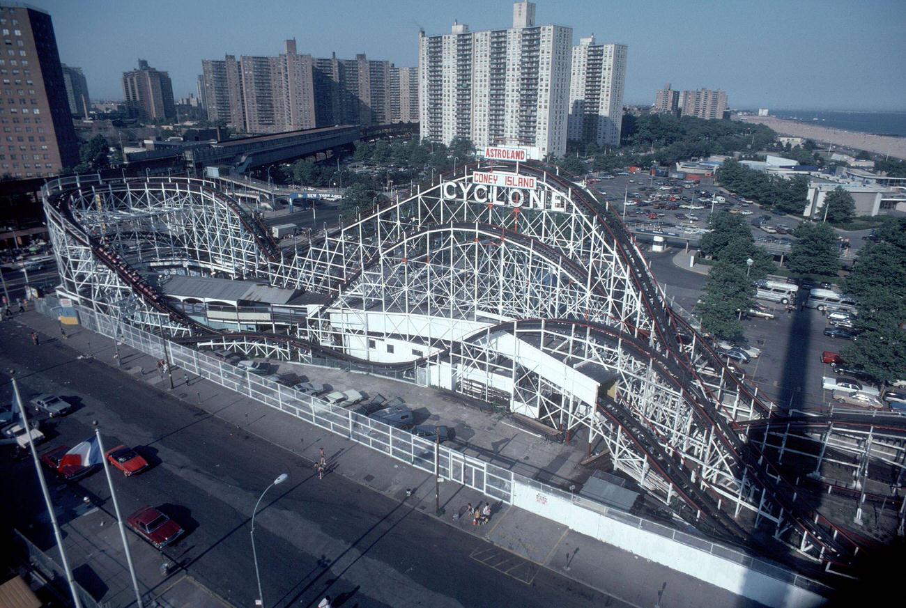 Cyclone Roller Coaster With Boardwalk And Atlantic Ocean In View, Coney Island, 1982
