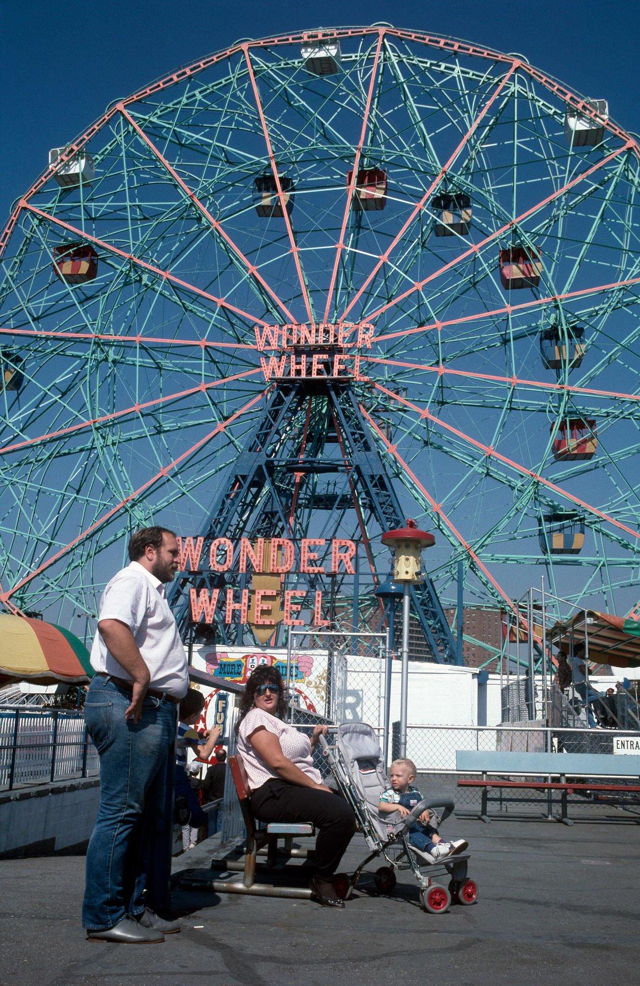 Couple In Front Of The Ferris Wheel At Coney Island, 1990S