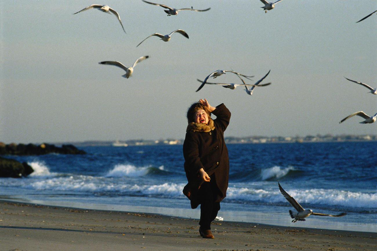 Russian Woman Feeds Seagulls At Brighton Beach, 1990S