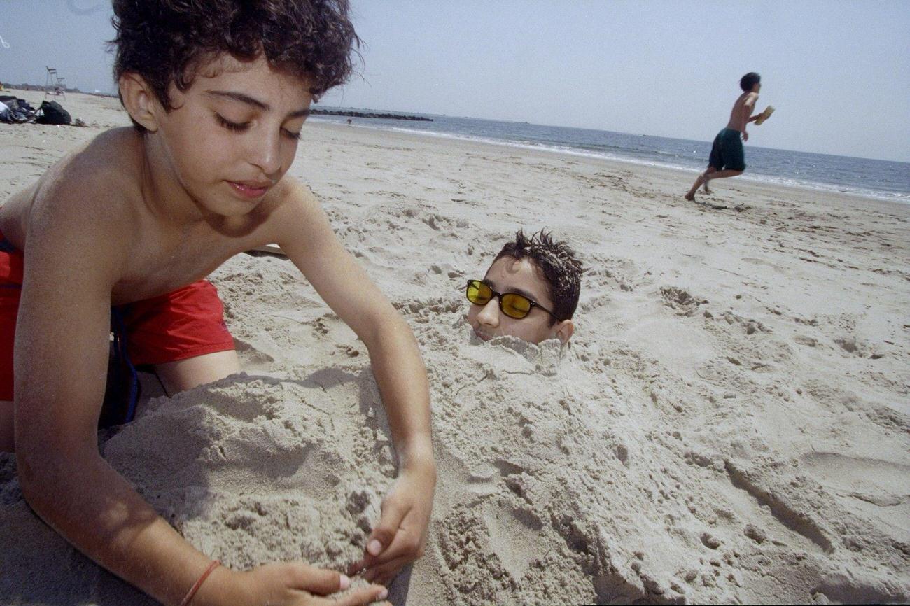 Anas Iliasse Covers Cousin Younes Tahiri With Sand, Coney Island, 1990S