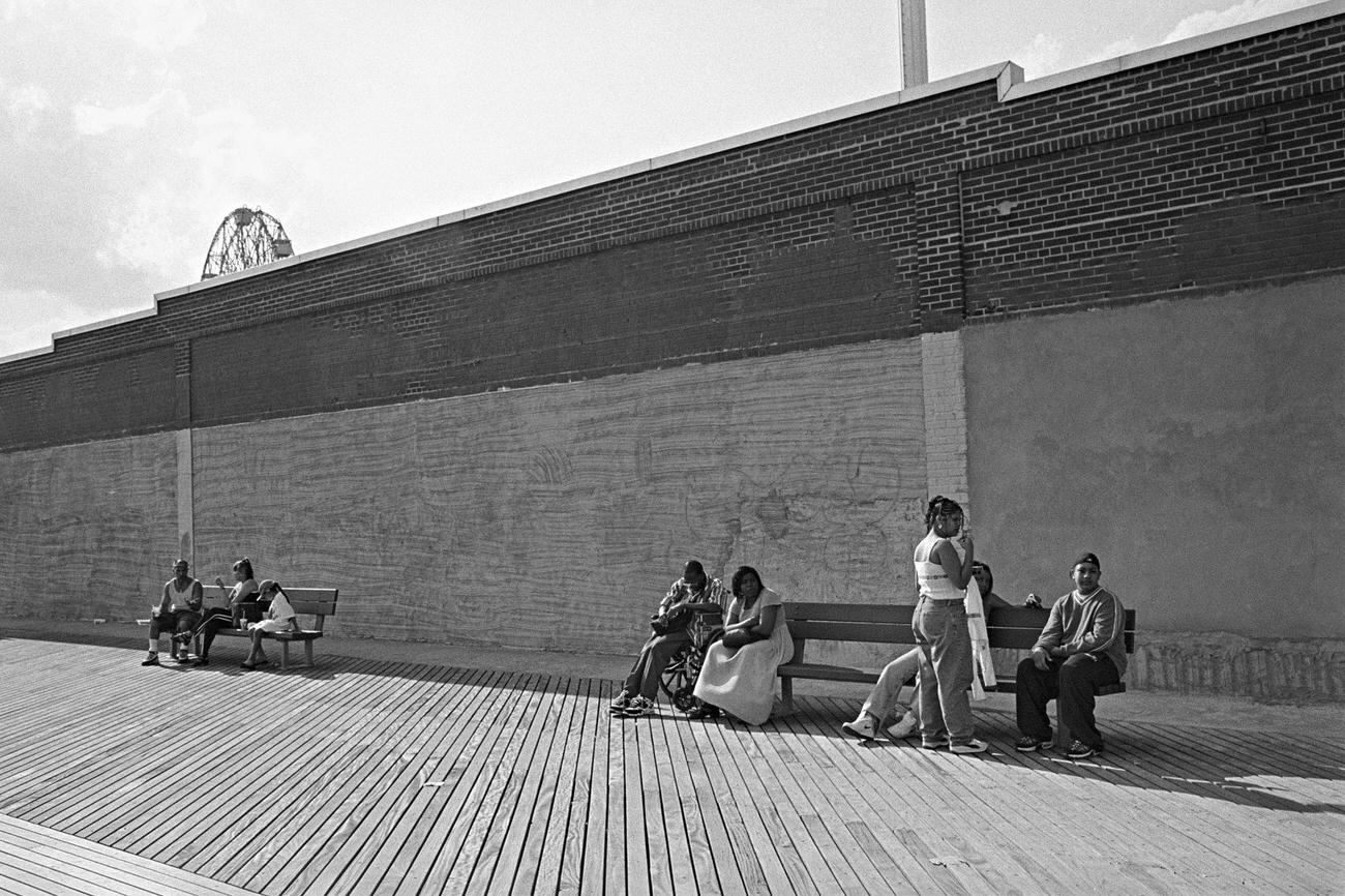 People Sit On Benches At Coney Island Boardwalk, 1990S
