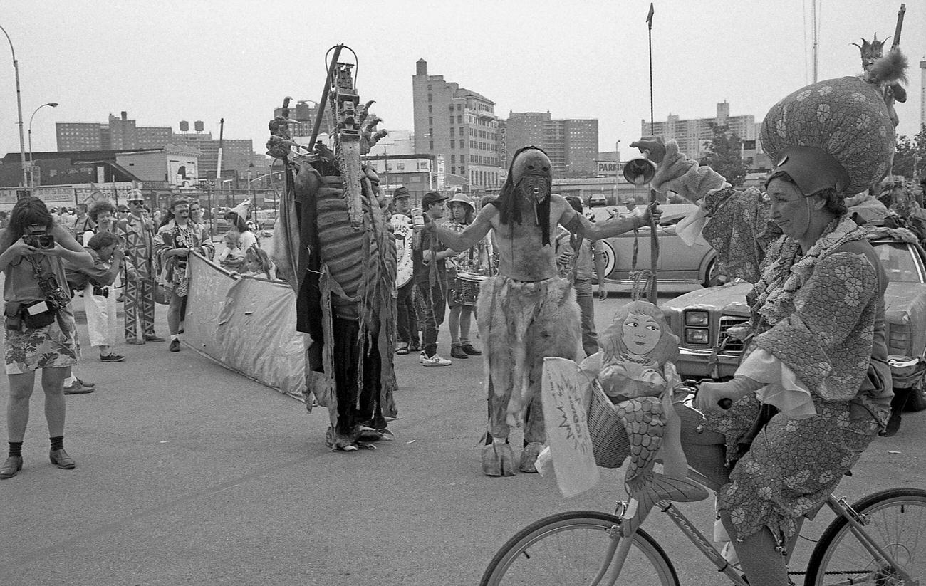 Revelers Pose In Costumes In Astroland Parking Lot Before Coney Island Mermaid Parade, 1989