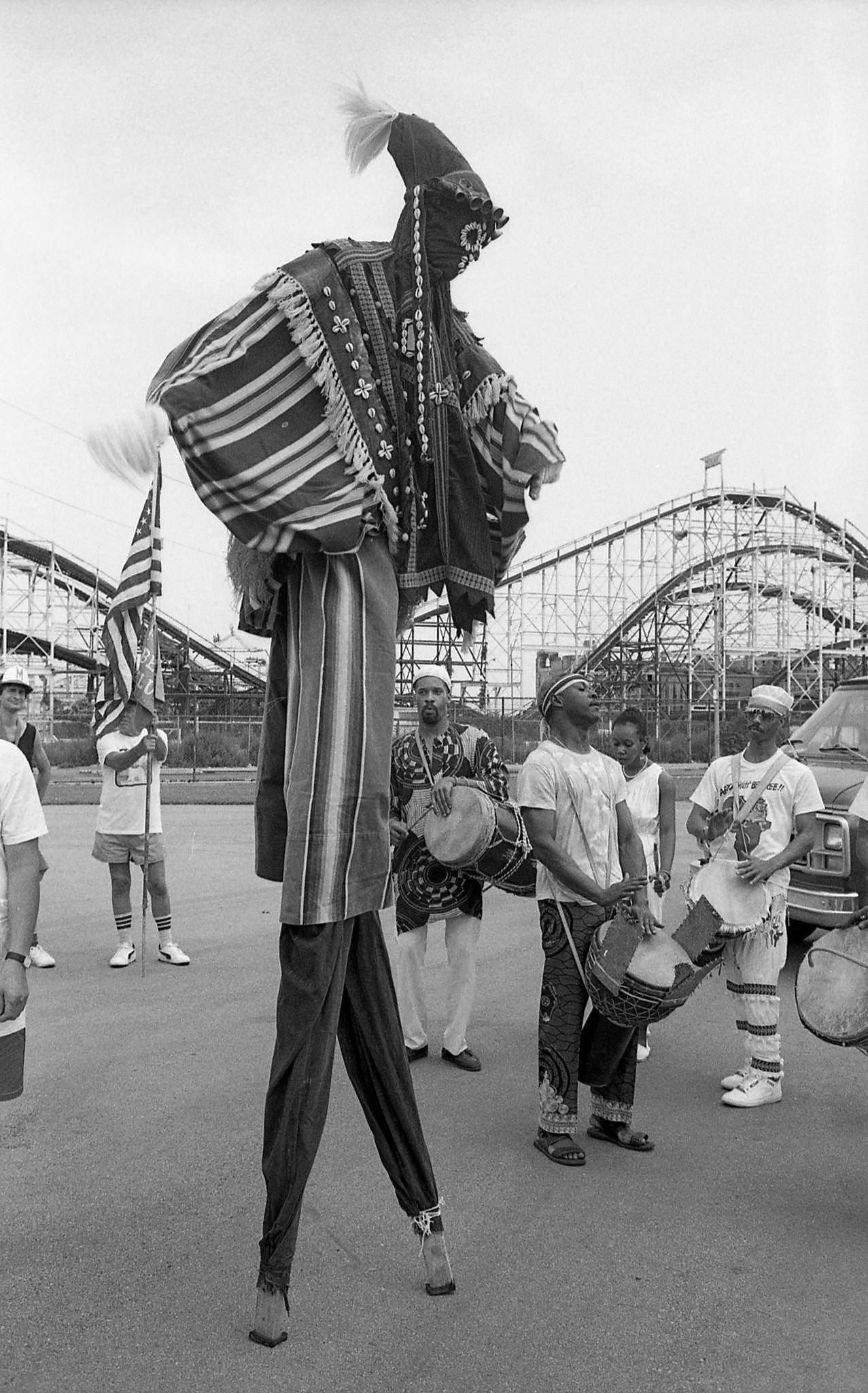 Street Performer On Stilts In Astroland Parking Lot At Coney Island Mermaid Parade, 1989