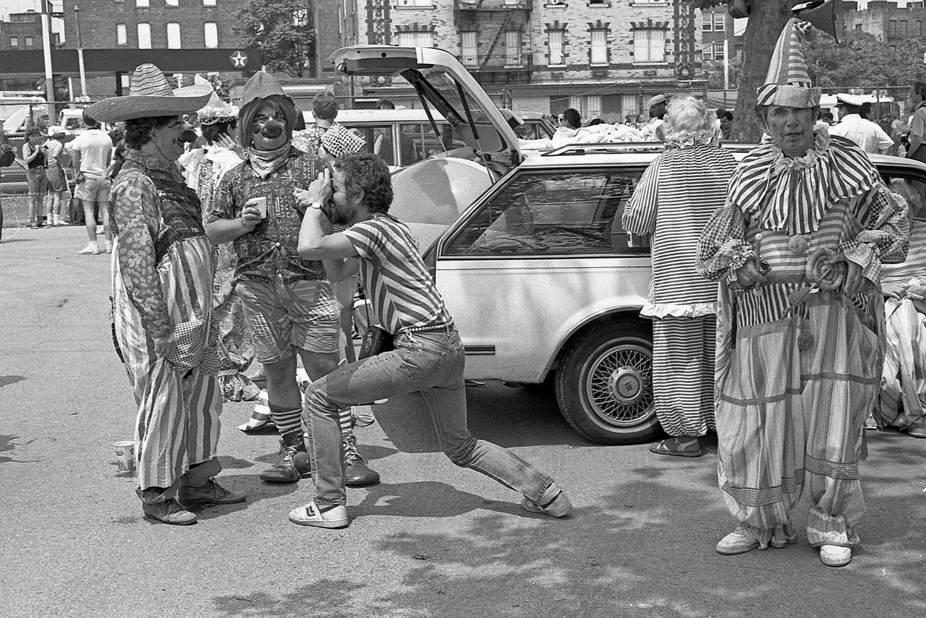 Photographer Takes Pictures Of Two Clowns At Coney Island Mermaid Parade, 1989