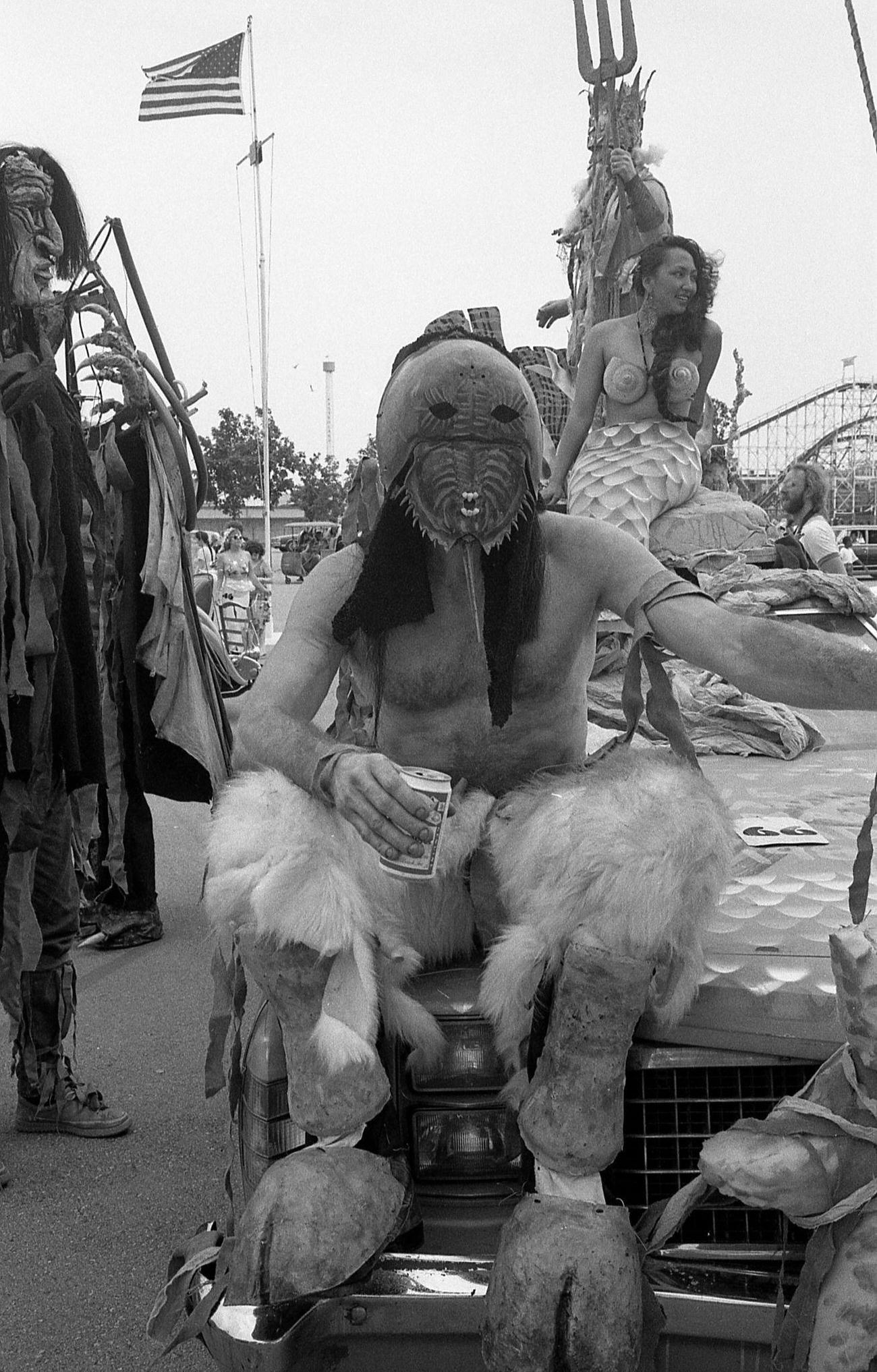 Man Dressed As Horseshoe Crab Poses With Drink At Coney Island Mermaid Parade, 1989