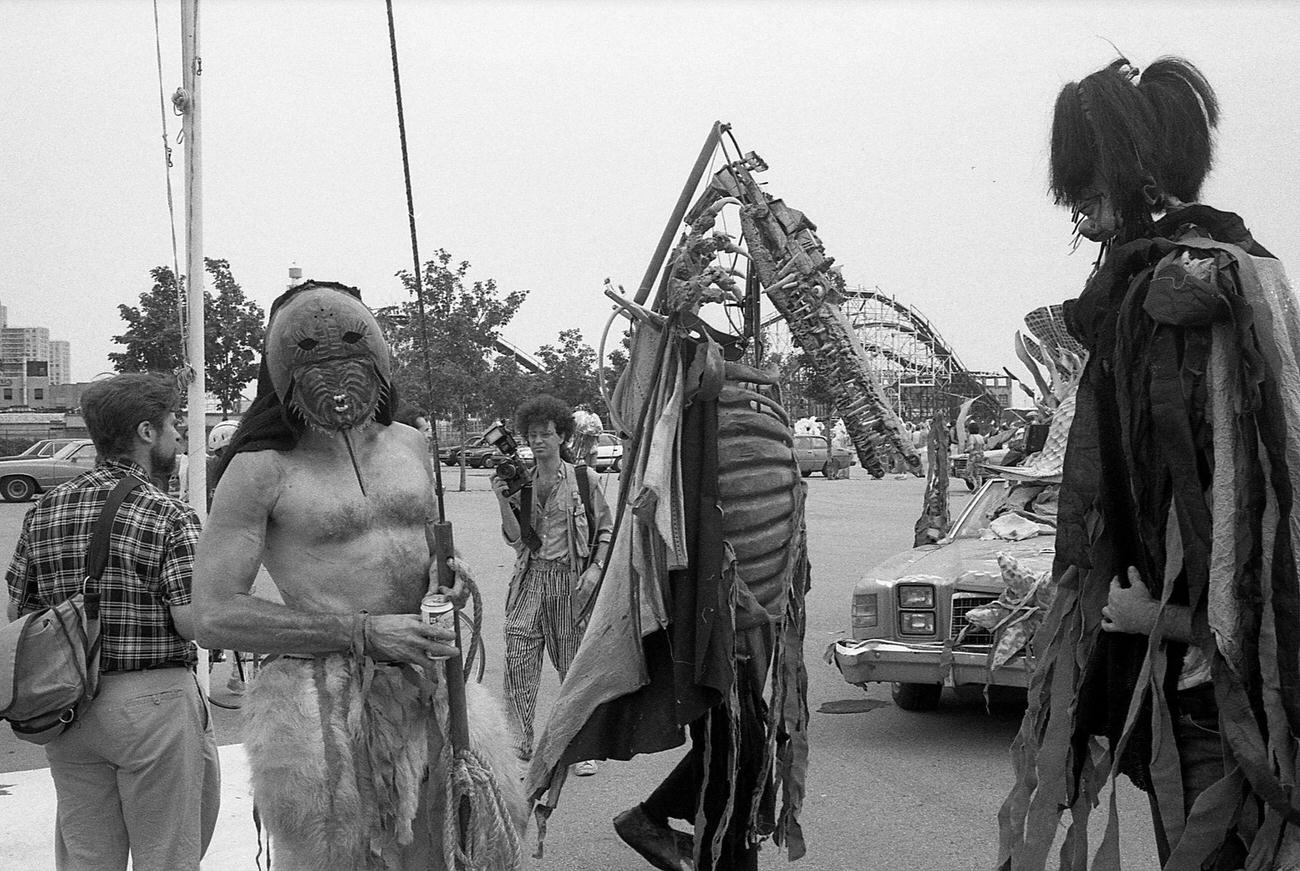 Costumed Paraders Including Horseshoe Crab And Seahorse Gather At Coney Island Mermaid Parade, 1989