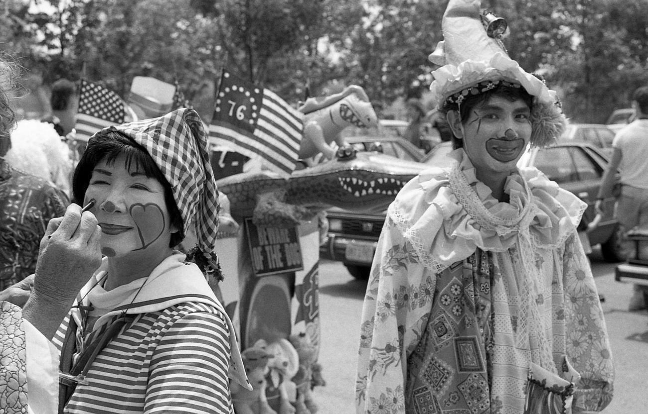 Street Performers In Clown Costumes Prepare For Coney Island Mermaid Parade, 1989