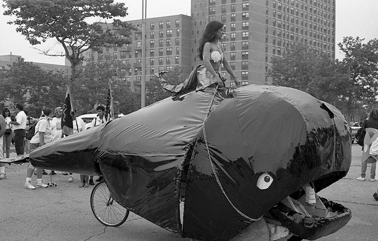 Mermaid Riding Pedal-Powered Whale Float, 1995