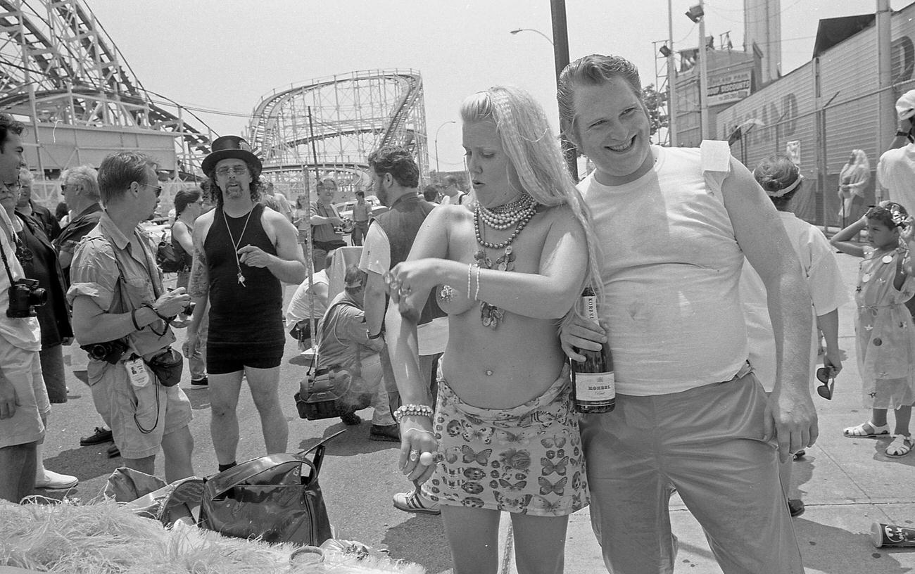 Woman And Man Pose As Greaser At Coney Island Mermaid Parade, 1997