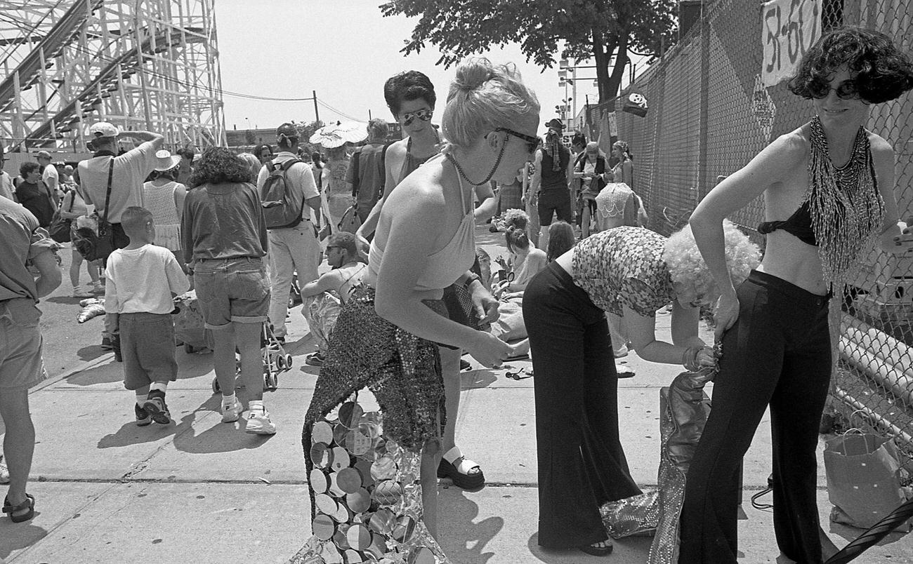 Participants Adjust Costumes Prior To Coney Island Mermaid Parade, 1997