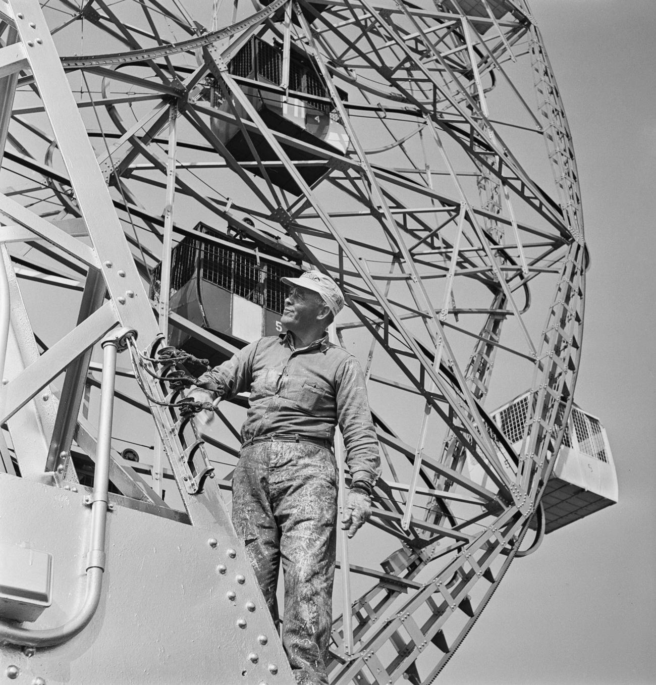 Worker Inspecting Ferris Wheel At Coney Island, 1950