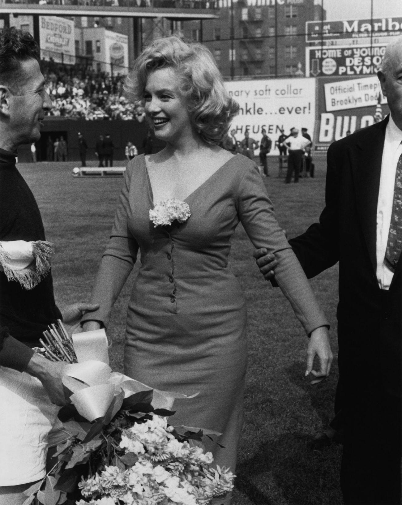 Marilyn Monroe With Israeli Goalkeeper Yaakov Hodorov At Ebbets Field, 1957