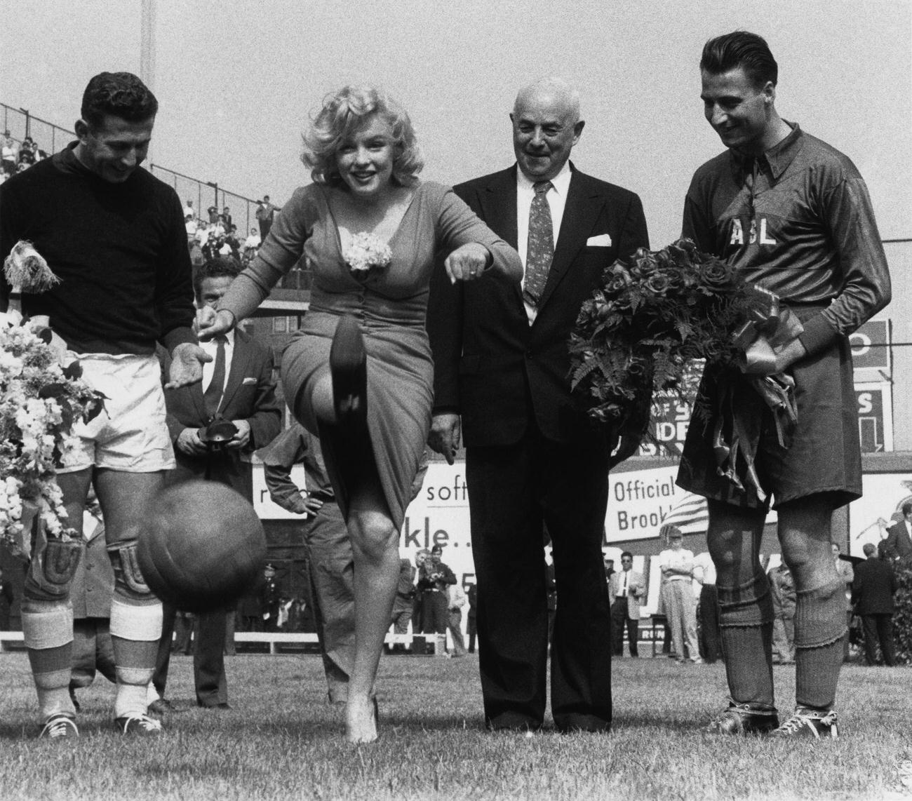 Marilyn Monroe Kicks Soccer Ball With Israeli Goalkeeper At Ebbets Field, 1957
