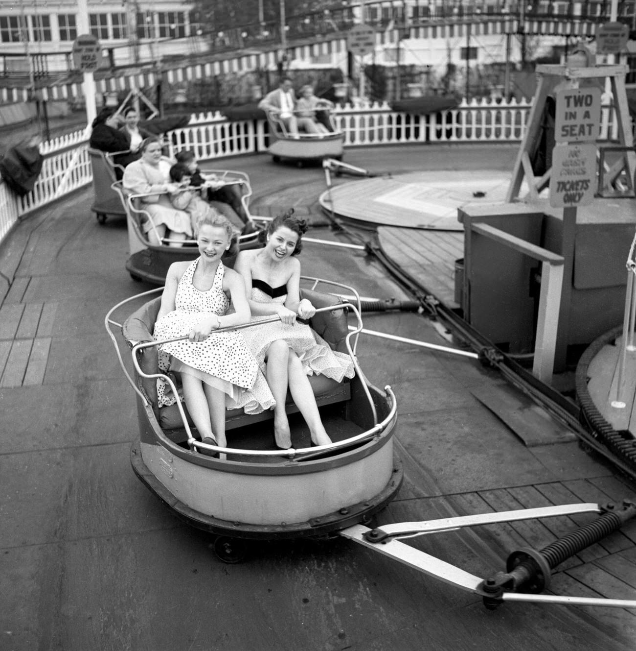 Connie Mavis And Marion James Ride The Whip At Steeplechase Park, 1953.