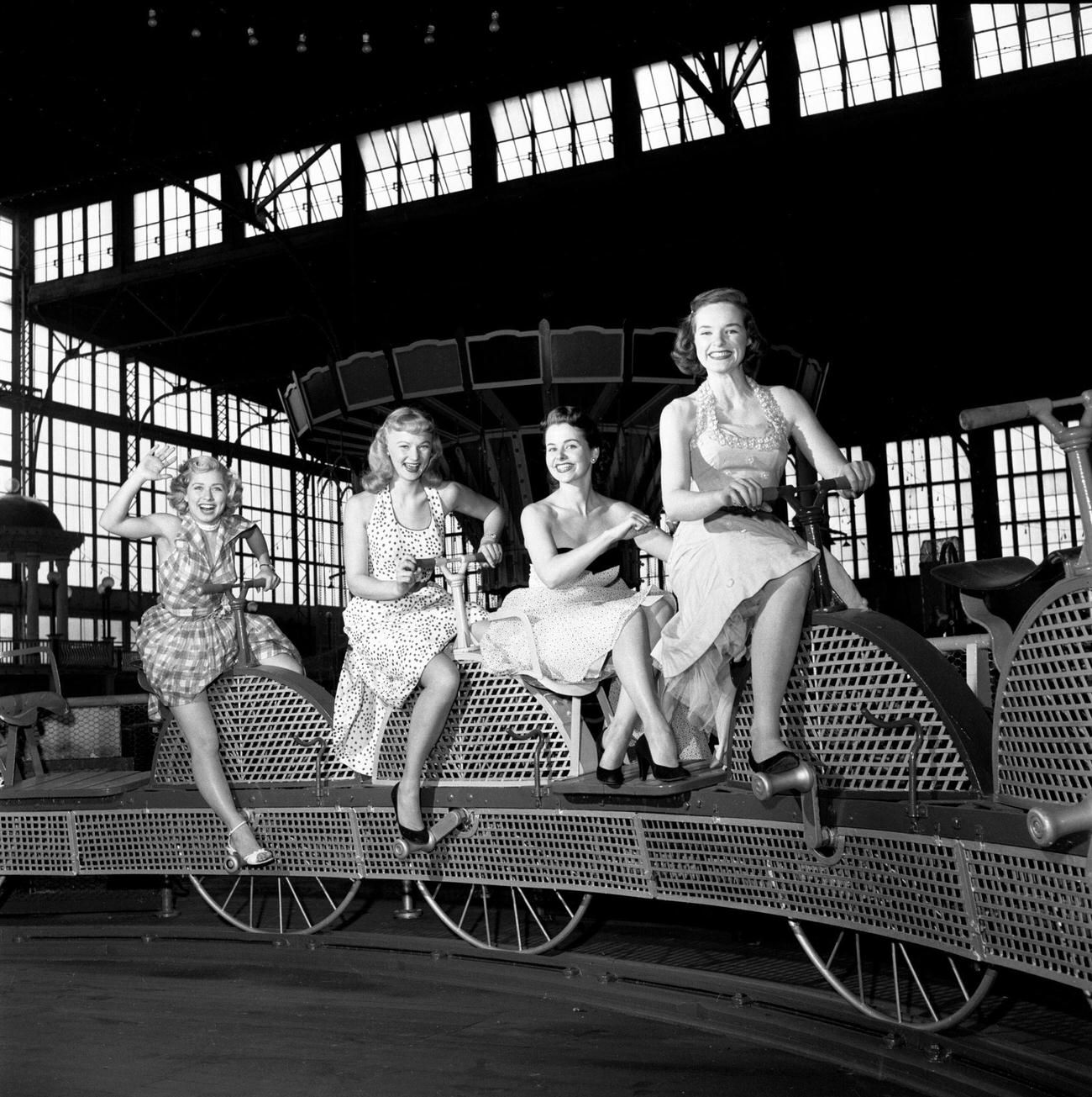 Cbs Models On The Bicycle Carousel Inside The Pavilion At Steeplechase Park, 1953.