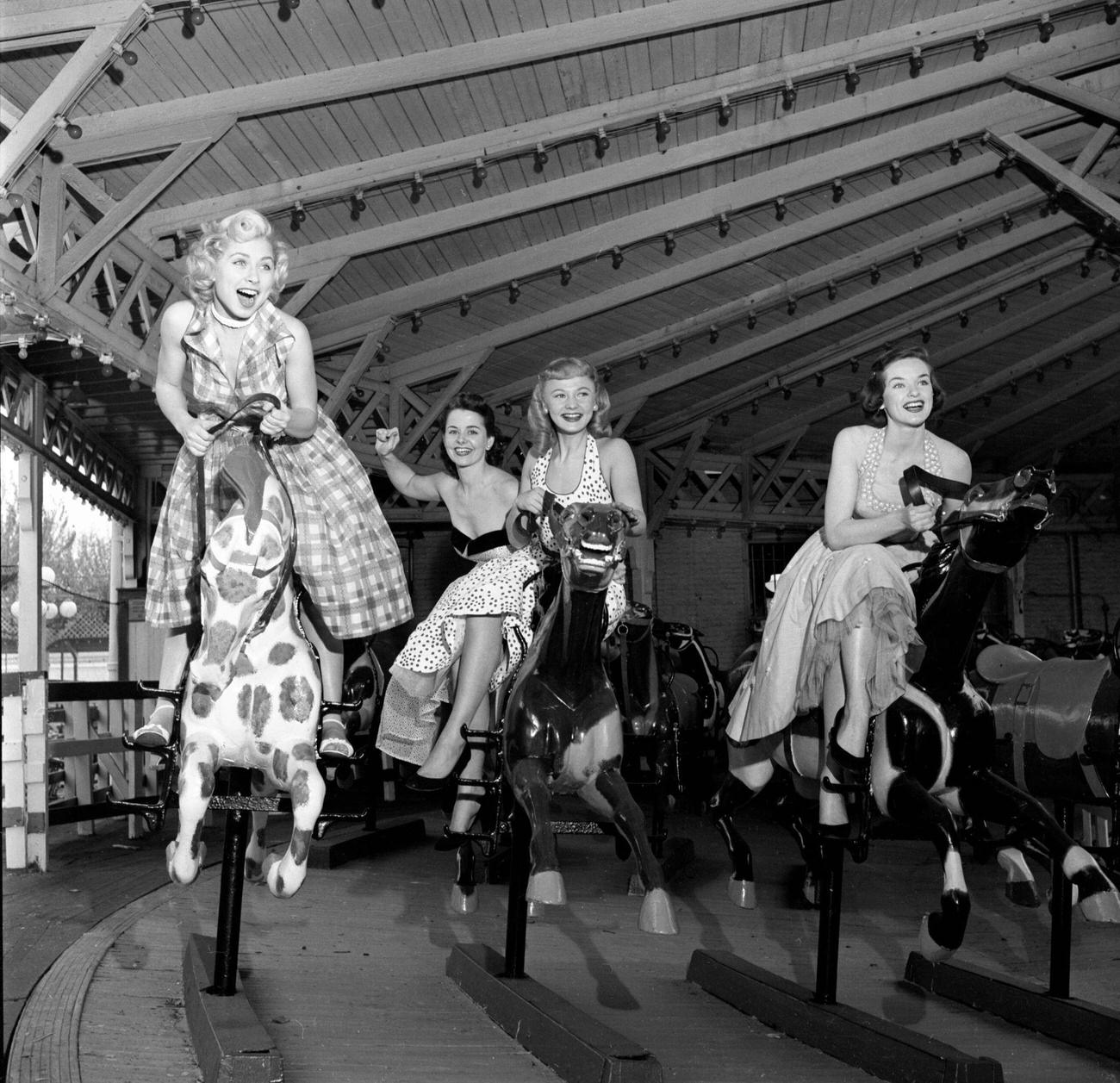 Cbs Models Ride The Great American Derby Racer At Steeplechase Park, 1953.