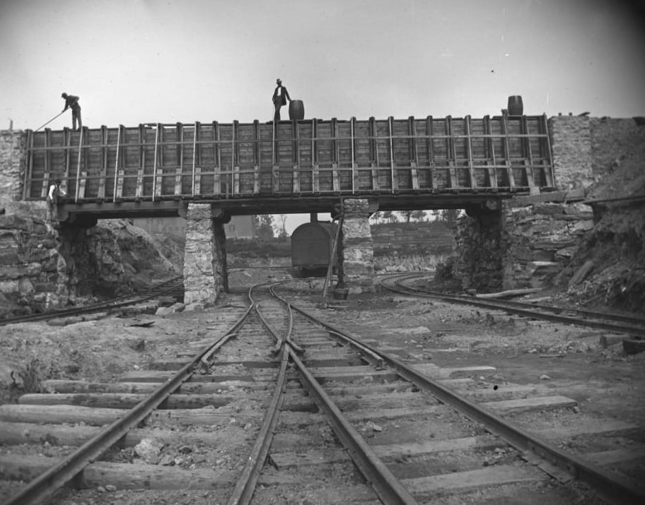 Railroad Tracks And Temporary Conduit For The Old Aqueduct During The Construction Of Jerome Park, Bronx, 1905-