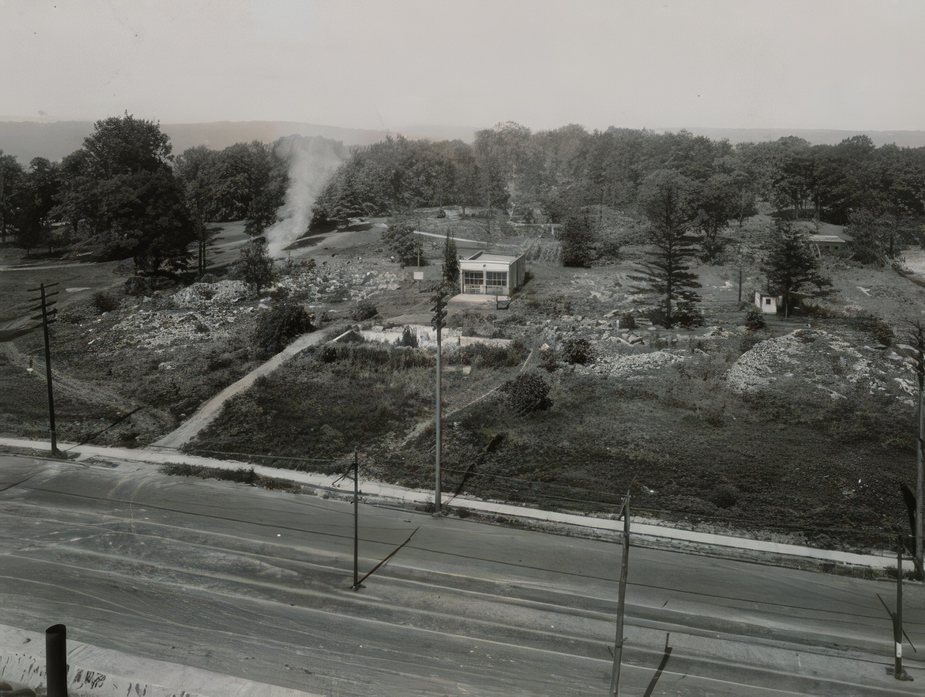 Overlooking Property On East Kingsbridge Road And 194Th Street, A Wooded Area With A Small House, Circa 1920.