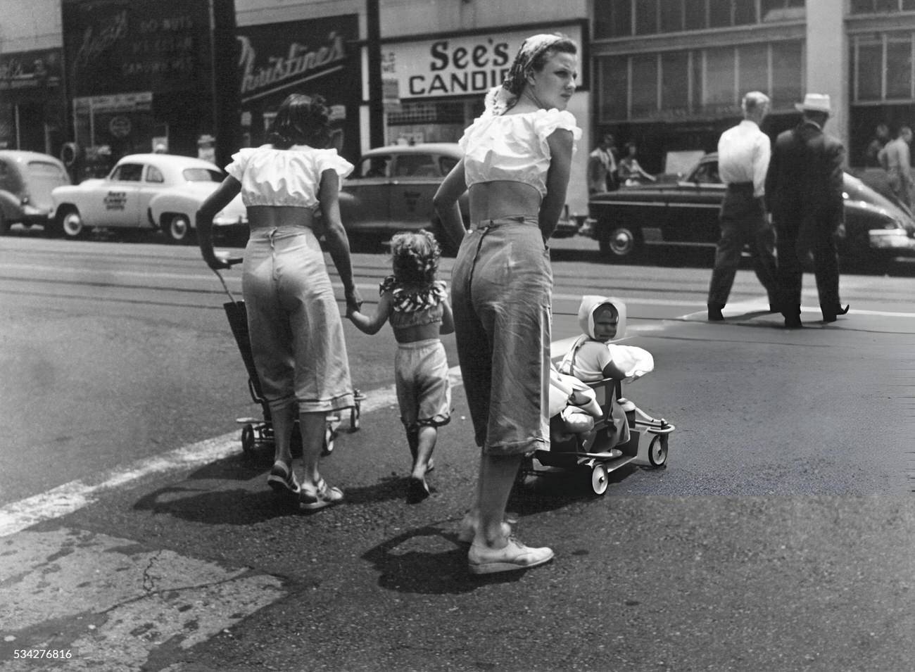 Women And Children Crossing A Street In The Bronx, 1940S.