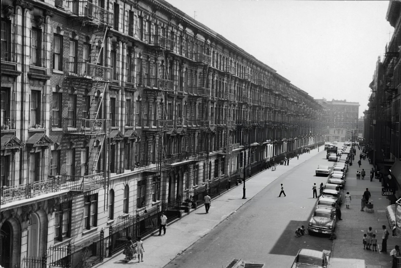 A High Angle View Of Apartment Buildings Along A Street In The Bronx, 1950S.