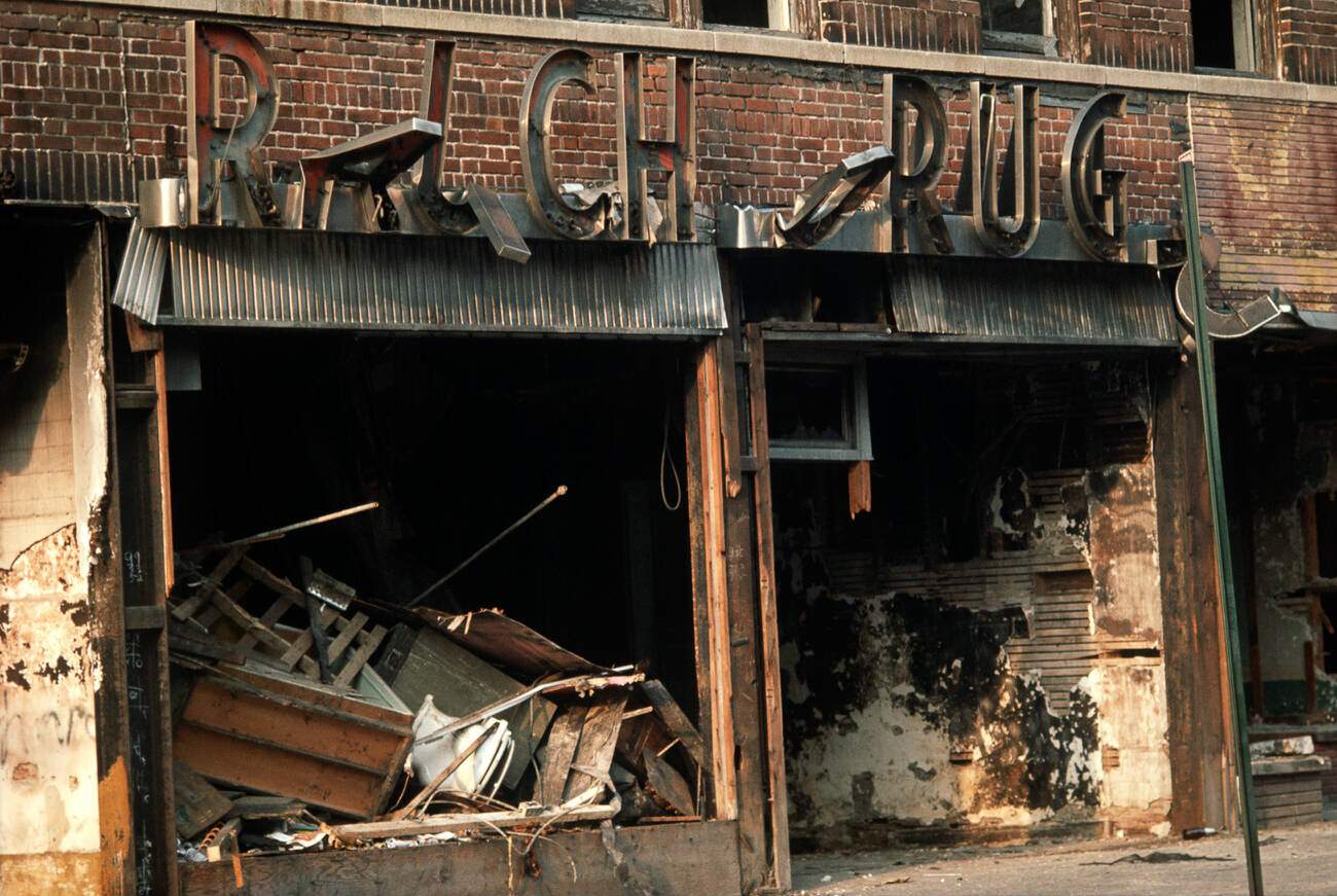 An Abandoned Burnt-Out Drug Store Marks The Landscape Of The South Bronx, 1970S