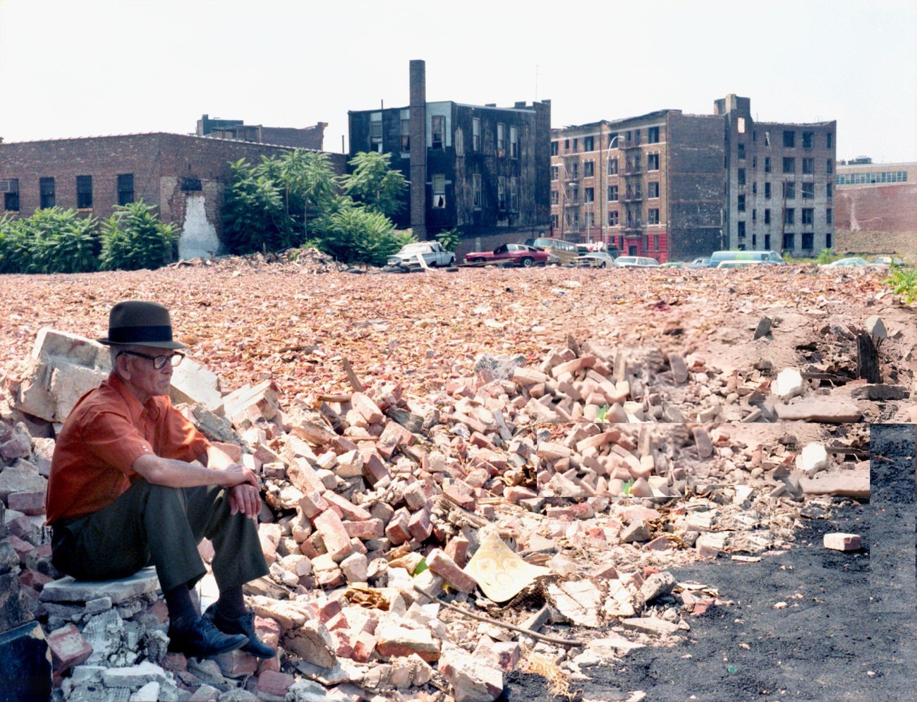 An Elderly Man Sits Among Rubble Of Bombed-Out Buildings In The South Bronx, August 1980.