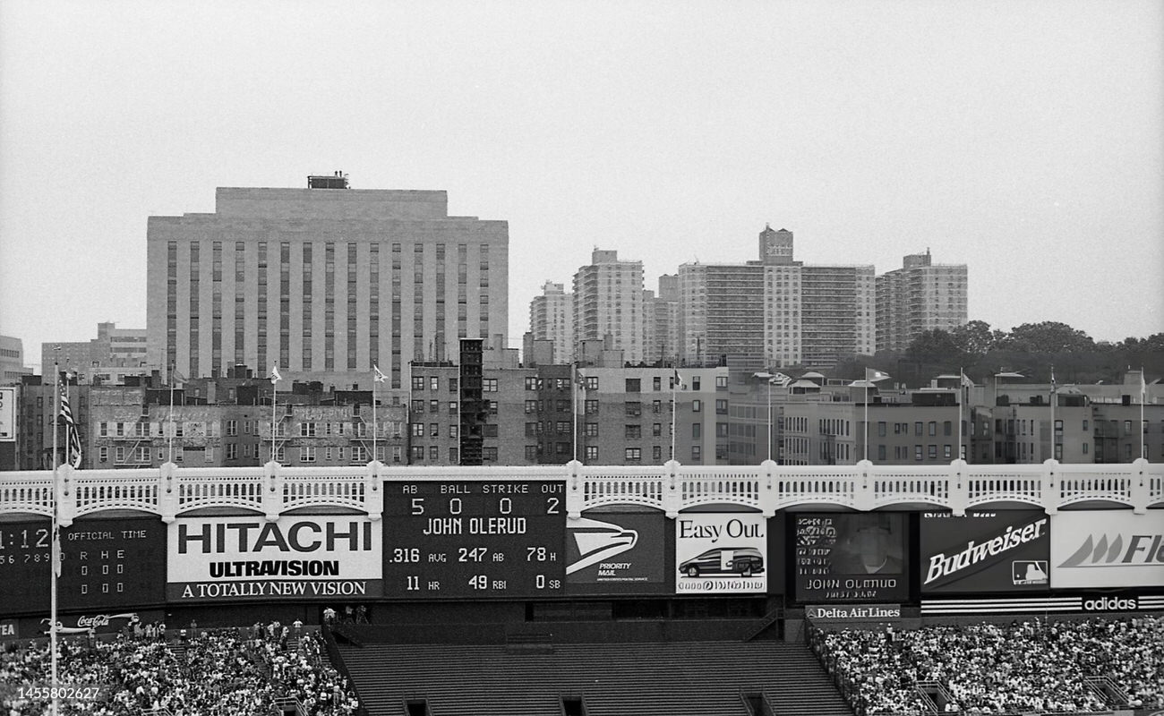 The Scoreboard At Yankee Stadium And Residential Apartments During A Game, Bronx, 1997.