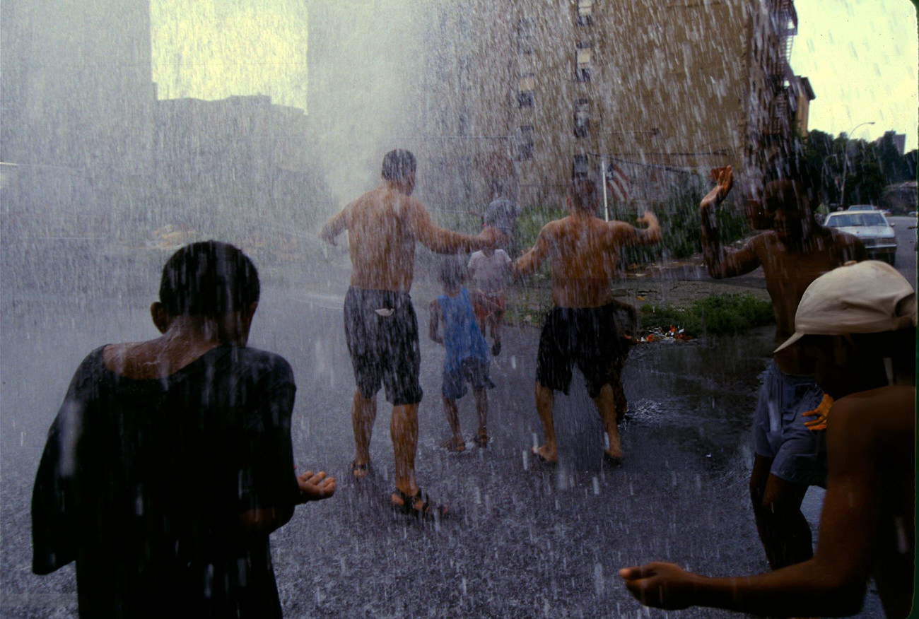 Residents Open A Fire Hydrant To Cool Off During A Heat Wave, Bronx, 1995.