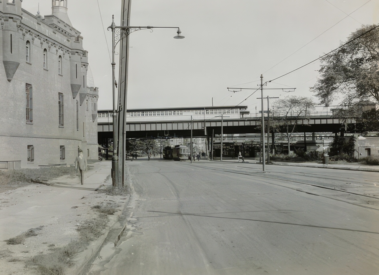 Street Next To Kingsbridge Armory With Elevated Railroad Station In The Background, 1915.