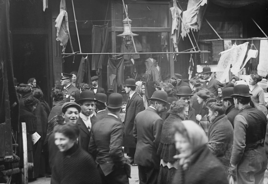 East Side Crowd Discussing Price Of Meat In Front Of Shops, New York, 1910S.