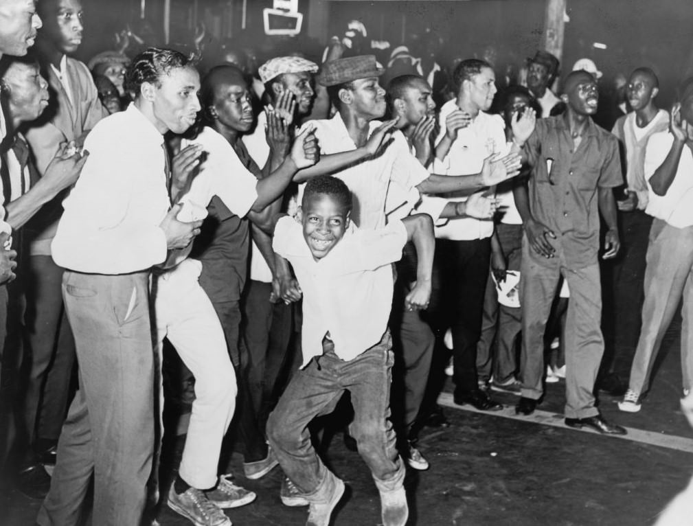 Part Of Crowd In Harlem Chants And Taunts Police On Lenox Ave, New York City, 1964.