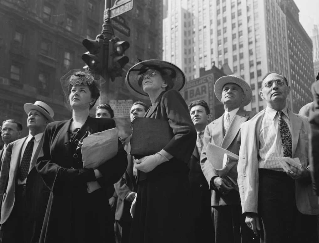 A Crowd Watching The News Line On The Times Building At Times Square, New York, 1944.