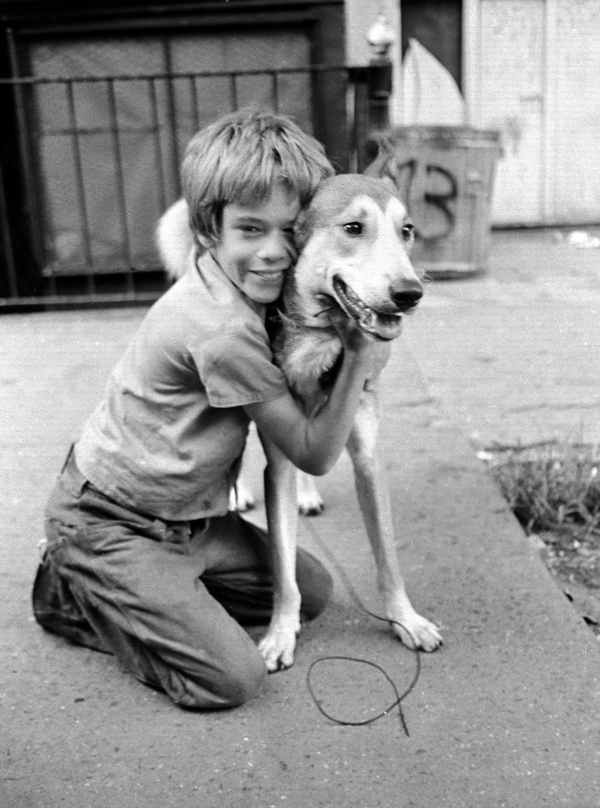 Fernando With His First Dog On East 3Rd Street, 1974.