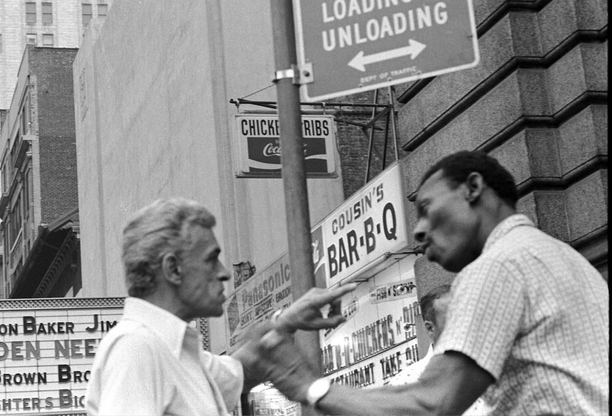 Fight on 42nd Street, NYC. Buy this print.