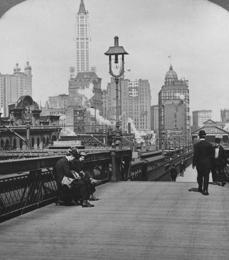 People Relaxing On Brooklyn Bridge Promenade, Circa 1900