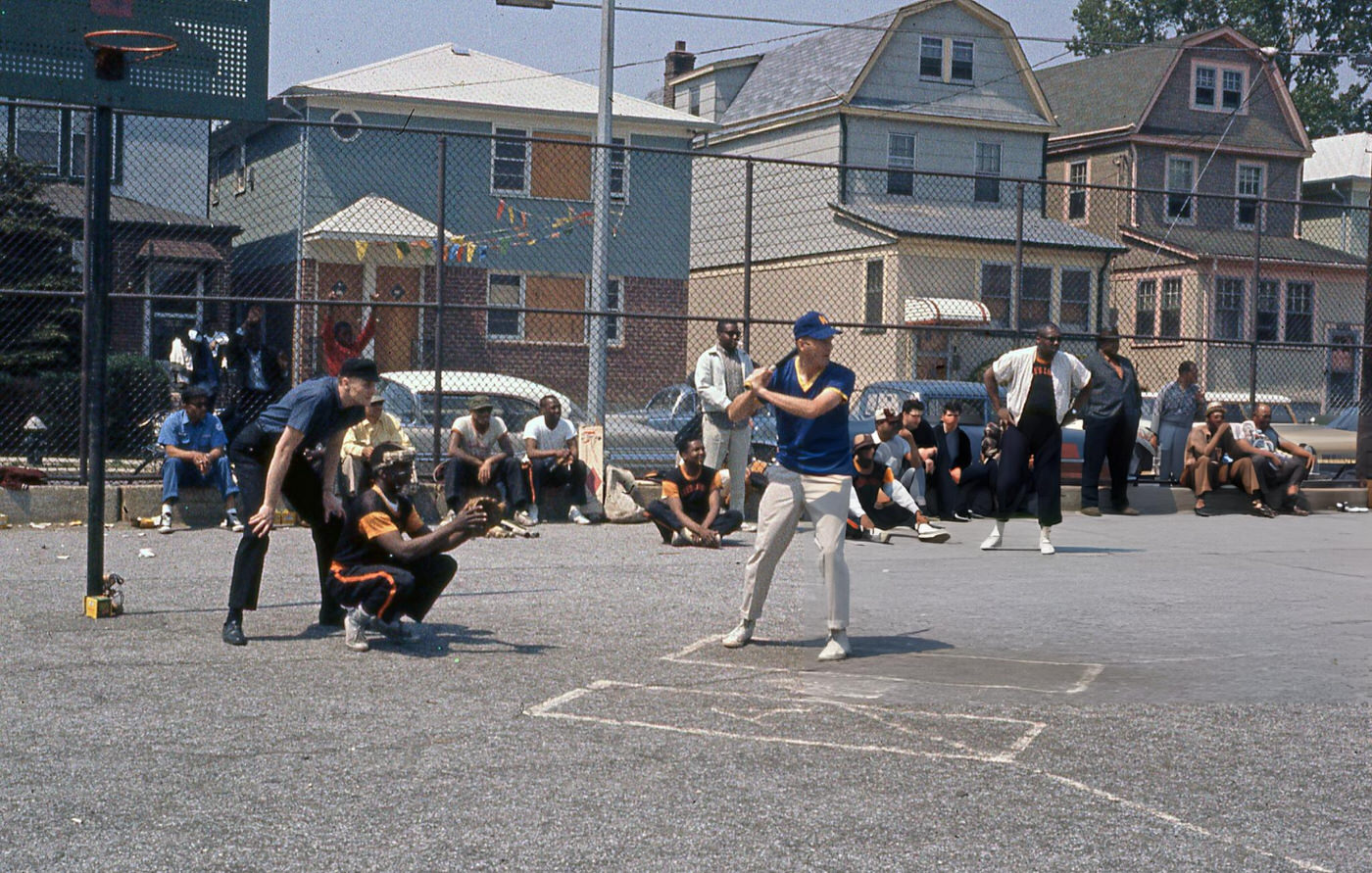 A Man Is At Bat During A Softball Game In The Ps 143 (Later Named Ps 143 Louis Armstrong) School Yard In Corona, 1960S.