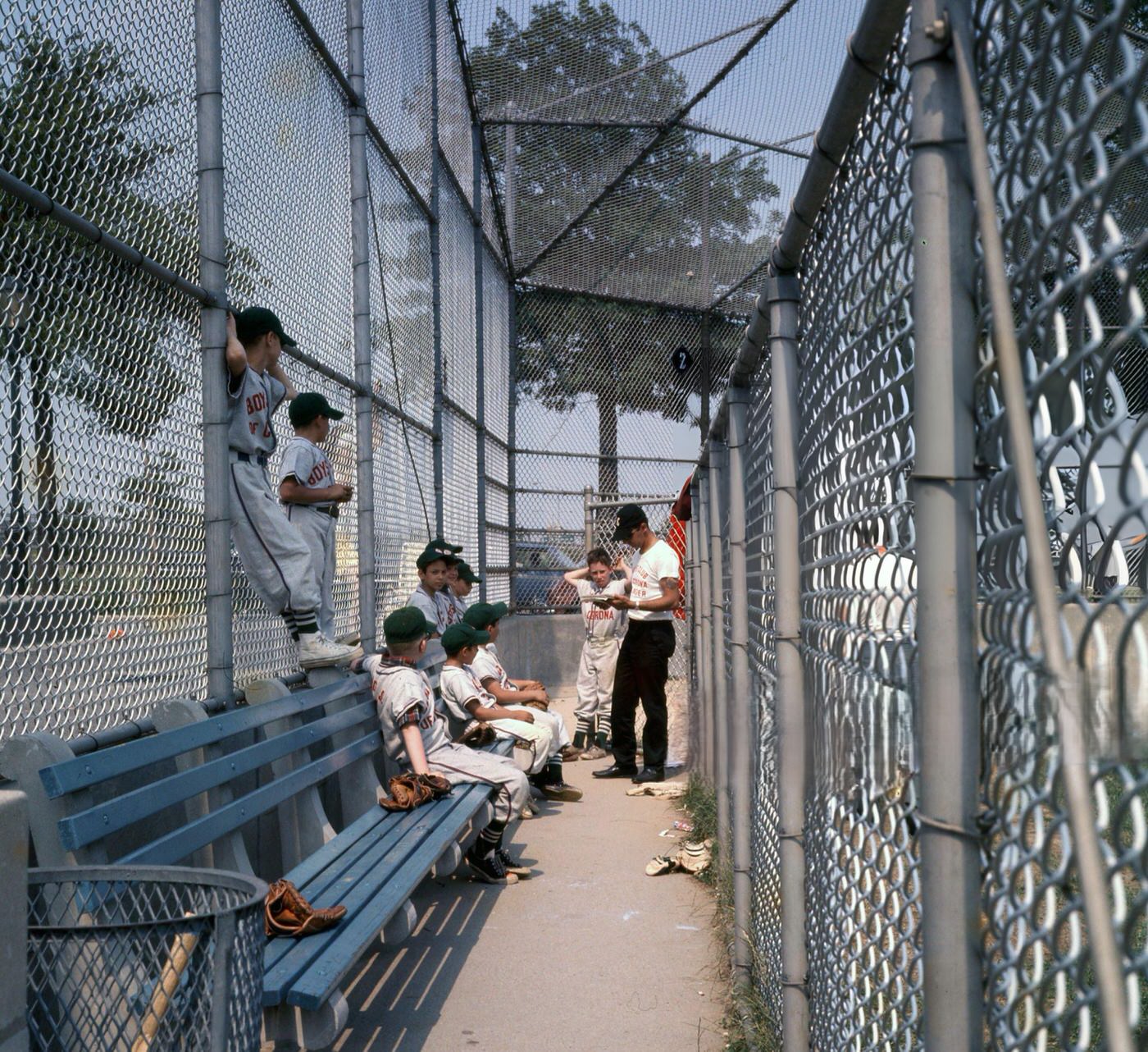 Players From A Boys Club Of Corona Little League Baseball Team With Their Coach In The Dugout, Flushing Meadows Park, 1968.