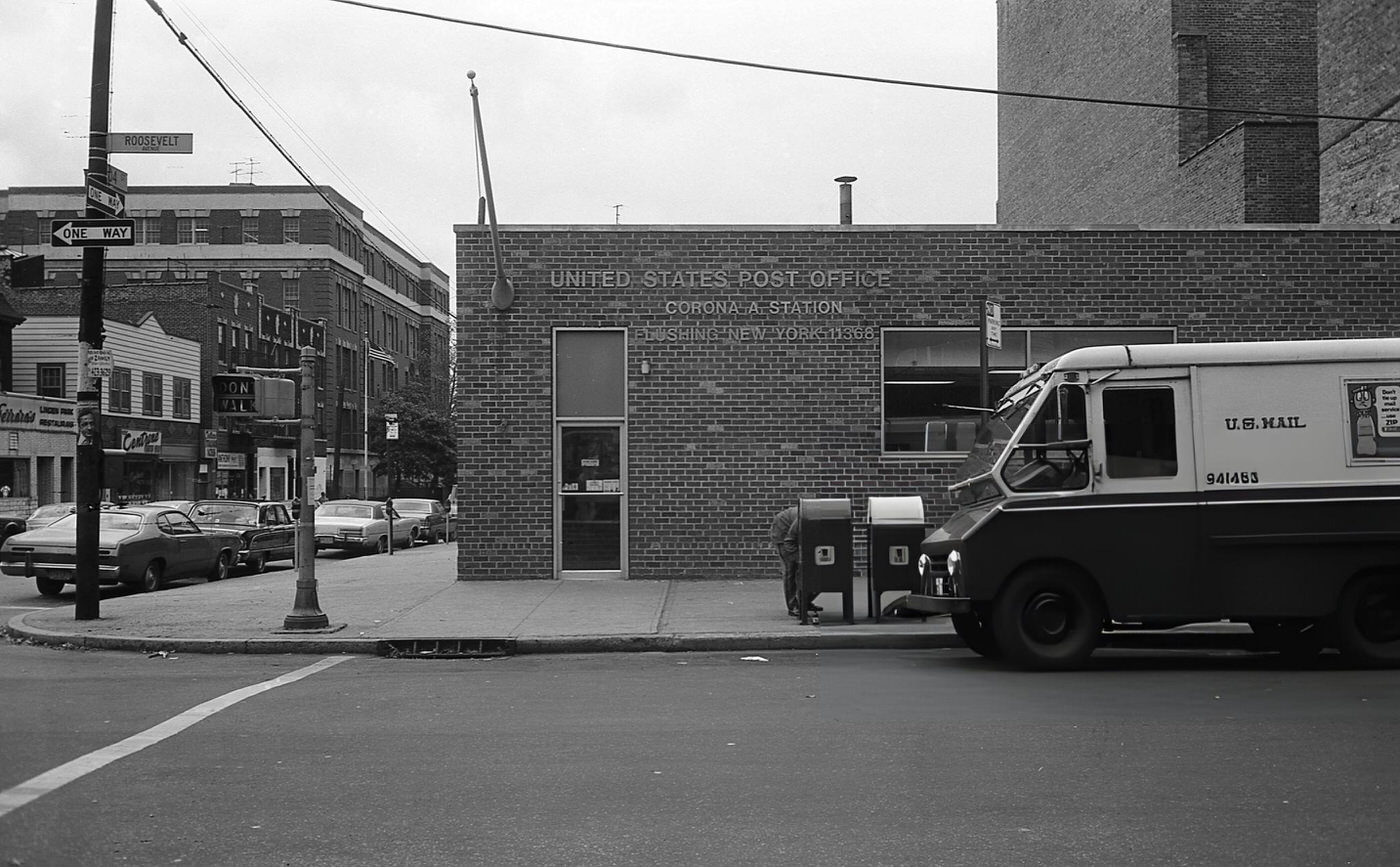 A Us Mail Truck Sits Parked In Front Of The Corona, Ny Post Office, 1970S.