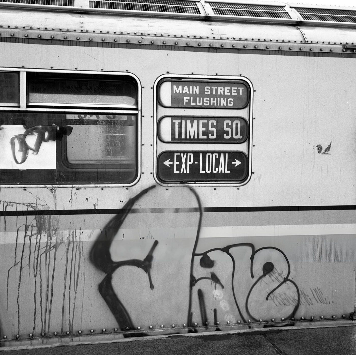 Graffiti On The Exterior Of A 7 Train At The Junction Boulevard Subway Station In Queens' Corona, 1975.