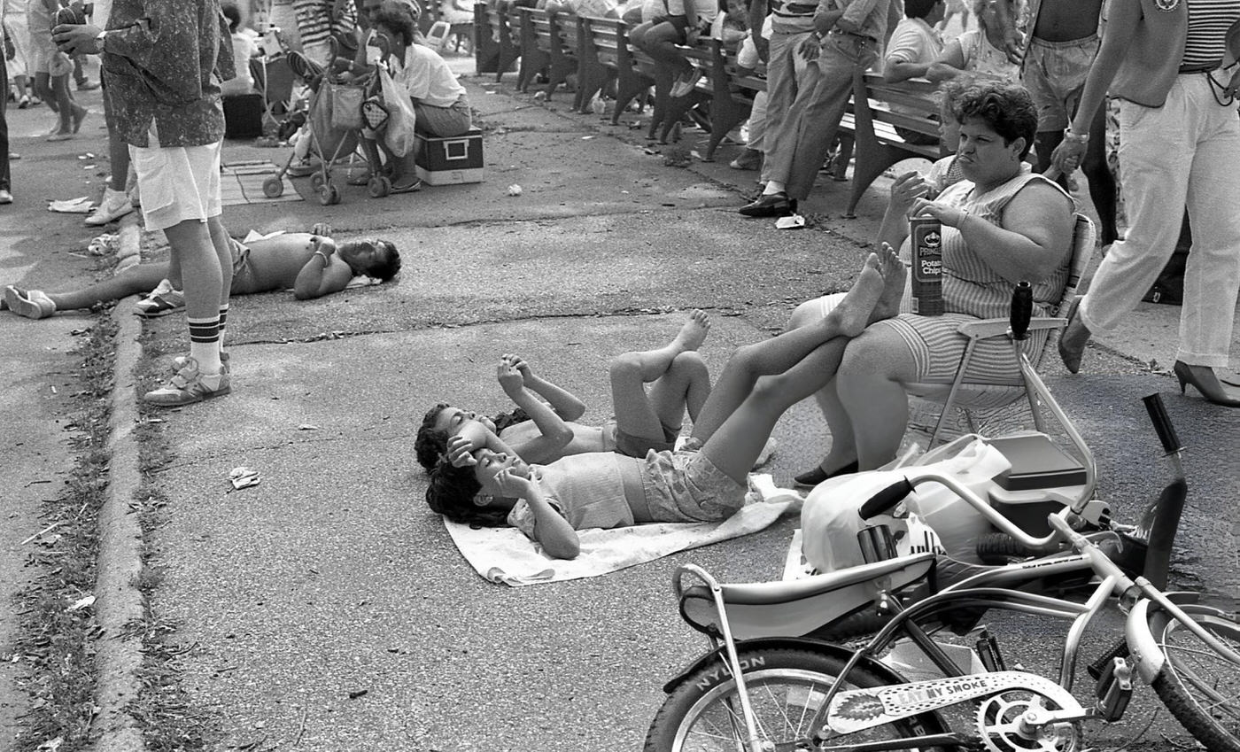 Two Boys Lie On The Ground In Flushing Meadows Park, Corona, Queens, 1988.