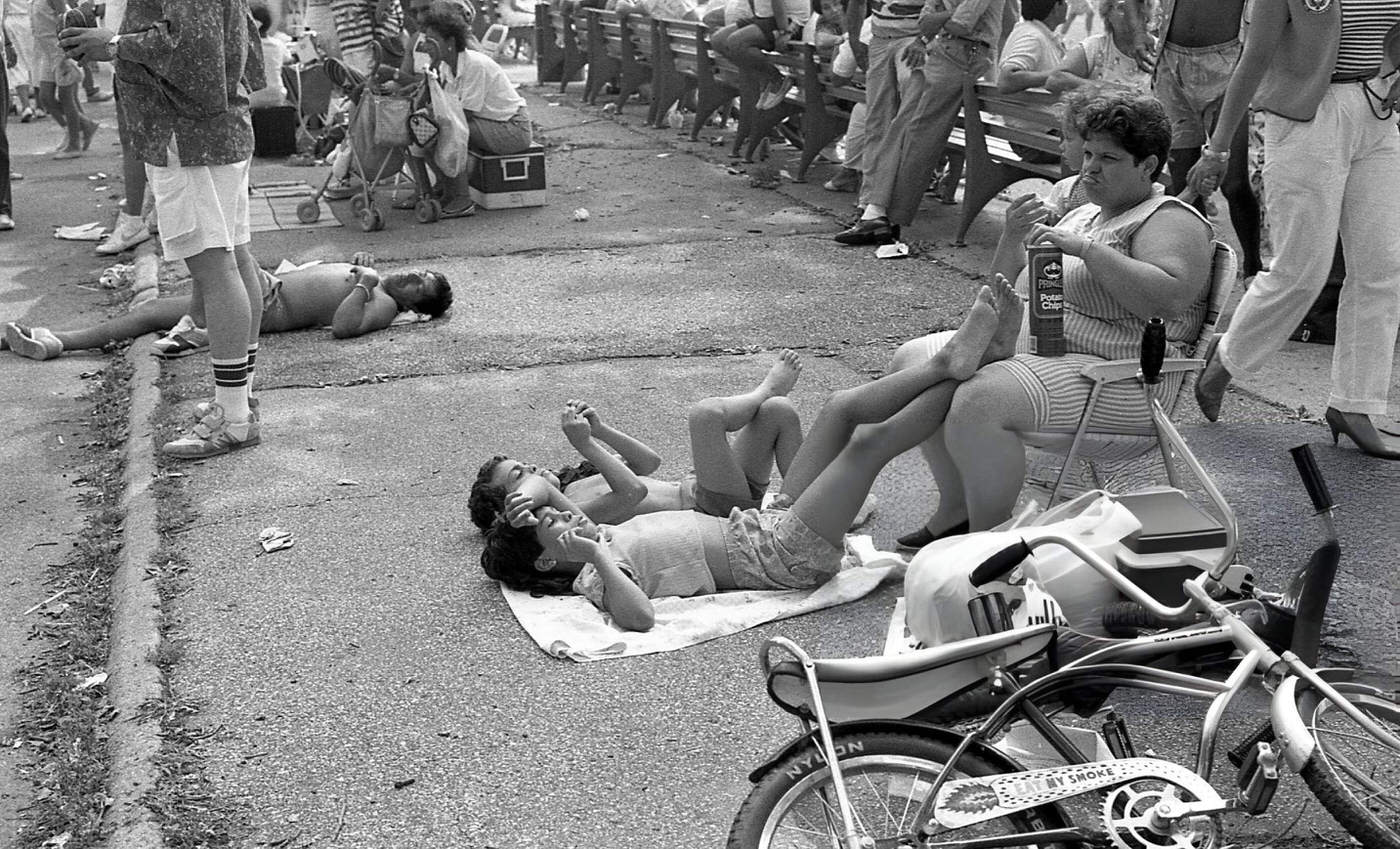 Two boys lie on the ground in Flushing Meadows Park, Corona, Queens, 1988.