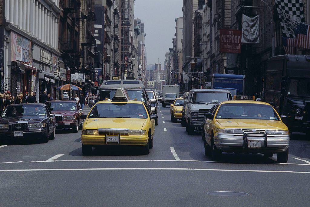 Taxis And Cars Crowding A Street Of Manhattan, 2000S.
