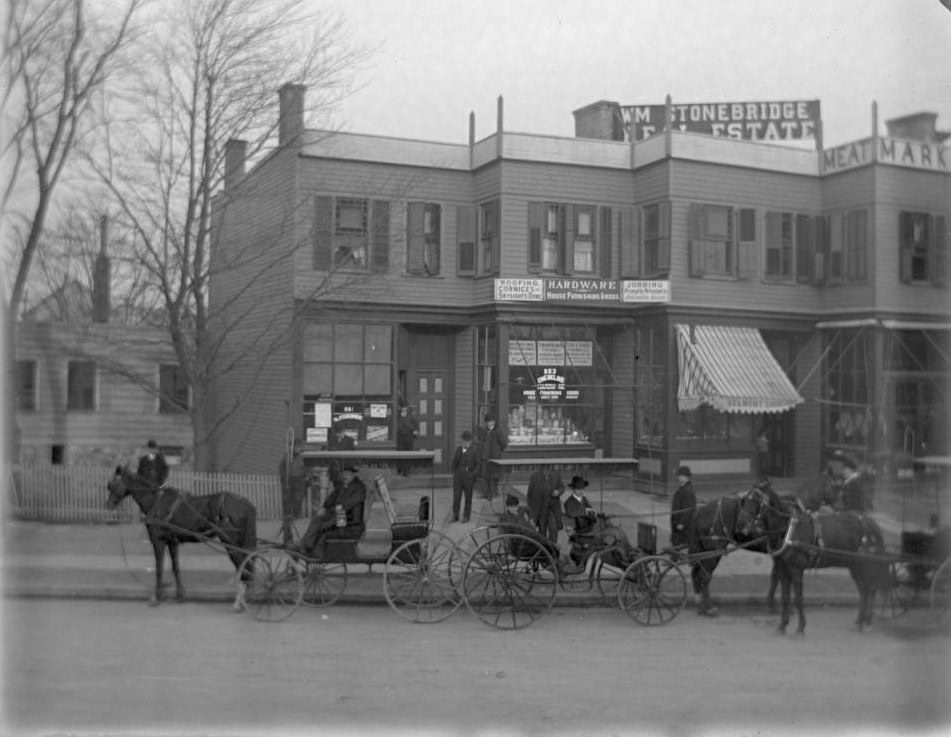 Horse-Drawn Carriages Parked Outside A Hardware Store In The Bronx, 1890S