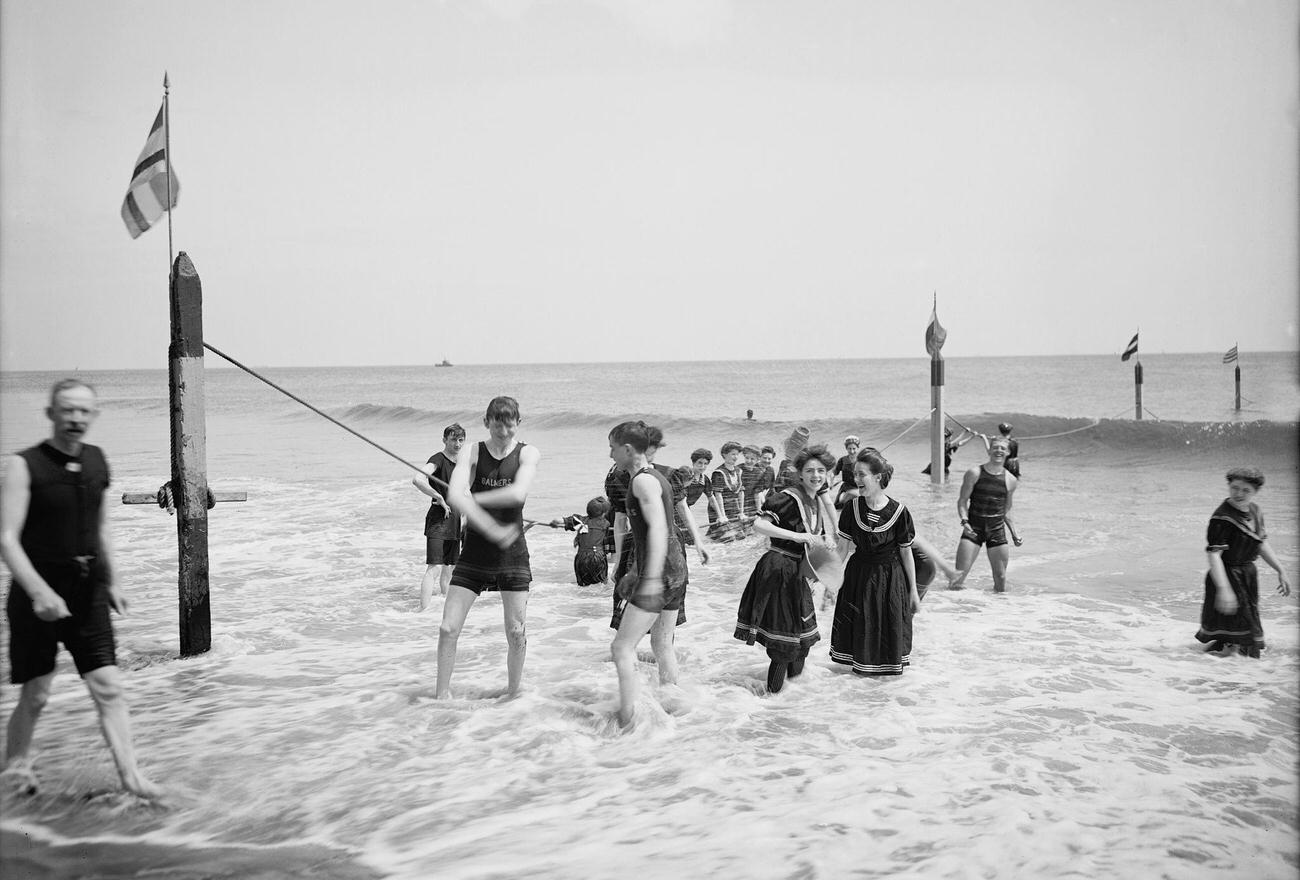 People Enjoying Ocean Beach At Coney Island, Circa 1900