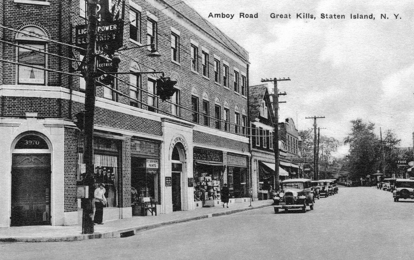Amboy Road Featuring Early 20Th-Century Cars And Shops With A Sign For 'Light, Power Gas Electric' In Great Kills, Staten Island, 1910.