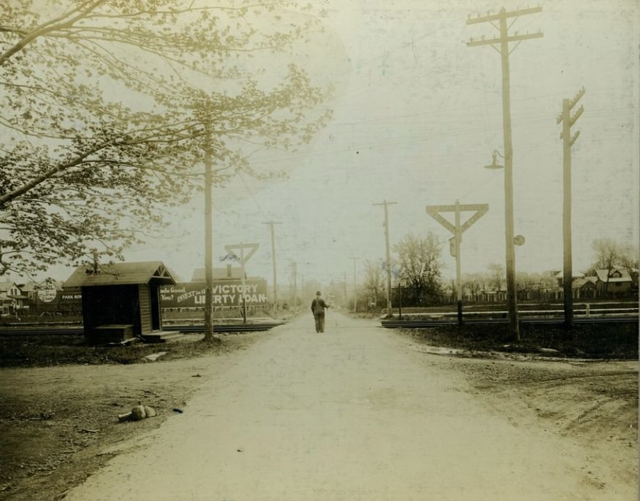 Change Along The Railroad In Grant City With A Crossing Guard At Midland Ave., 1920.