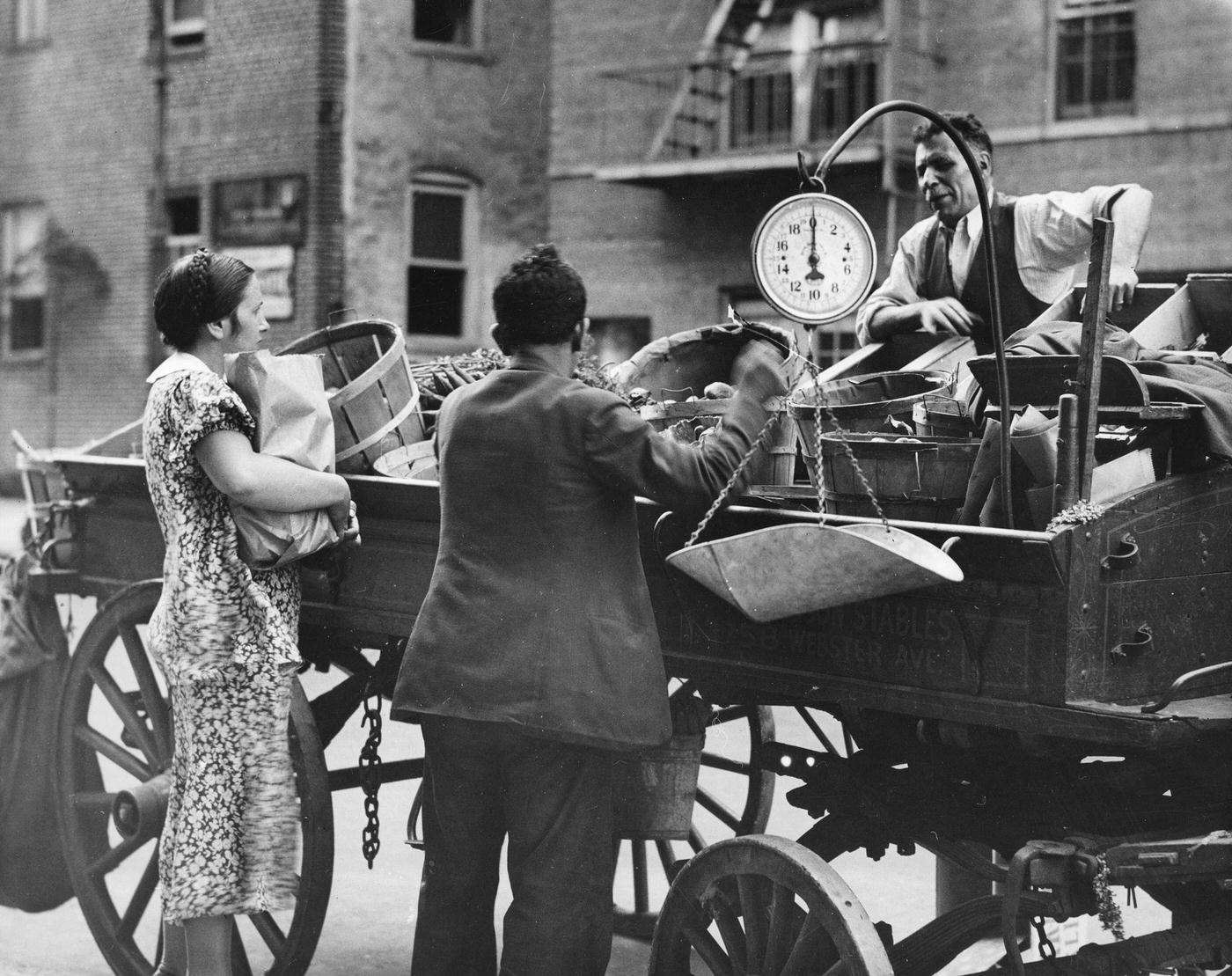 Two People Purchase Items From A Vendor On Manhattan'S Eastside, 1930S