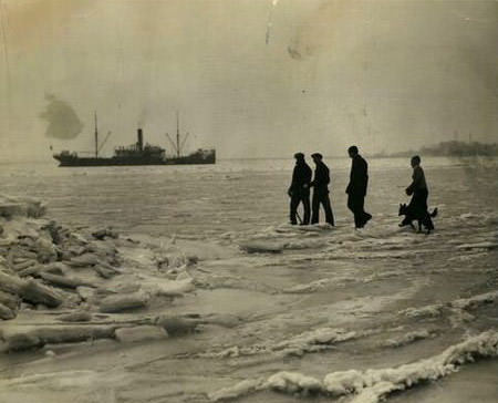 Tottenville Residents Walk On Frozen-Over Raritan Bay, Ship Waits For Ice To Thaw, 1936.