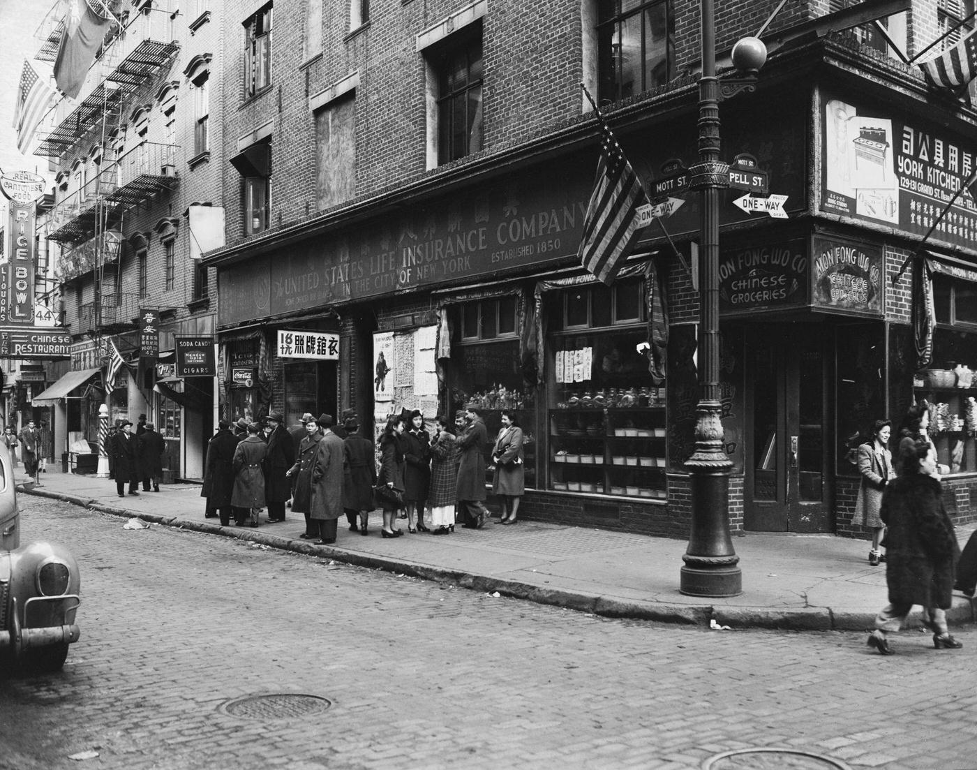 United States Life Insurance Company On The Corner Of Mott Street And Pell Street In Chinatown, Manhattan, 1940.