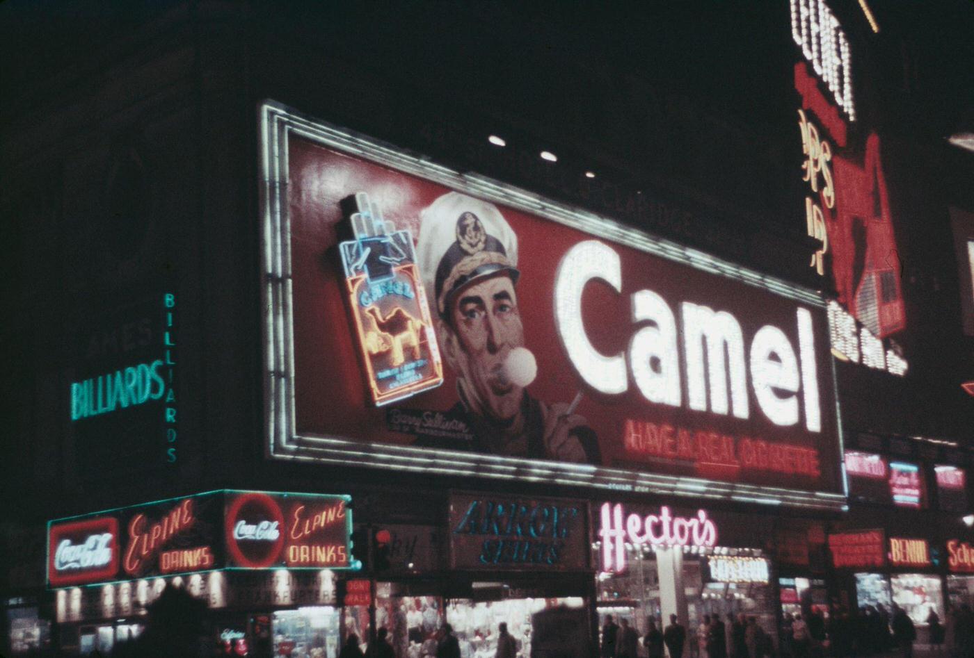 Camel Cigarettes Advertisement Illuminated At Night In Times Square, Manhattan, 1957.